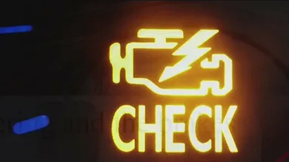Check engine light icon illuminated, indicating a diagnostic alert for vehicle maintenance and repair services.